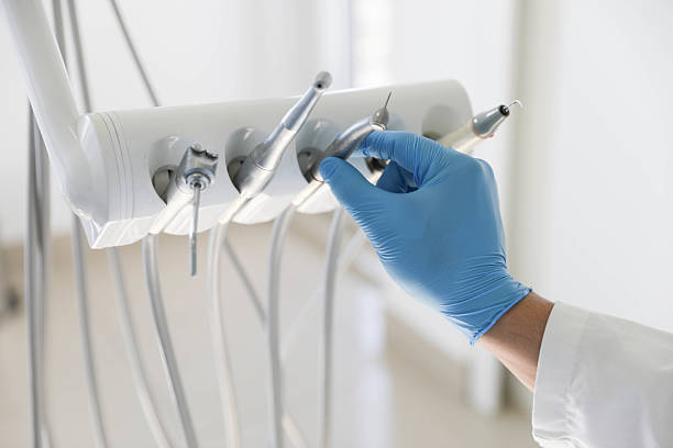 Professional Tooth Extraction technician working in Sherman, IL